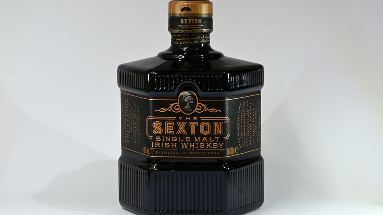 A product shot of The Sexton single malt in front of a plain white background