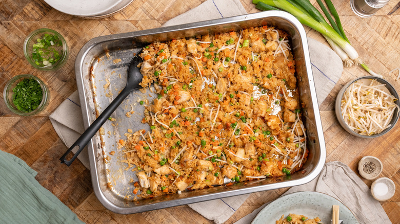 Sheet pan with partially eaten chicken fried rice