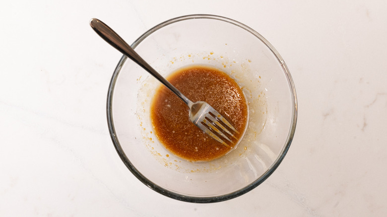 marinade mixed in a bowl with fork