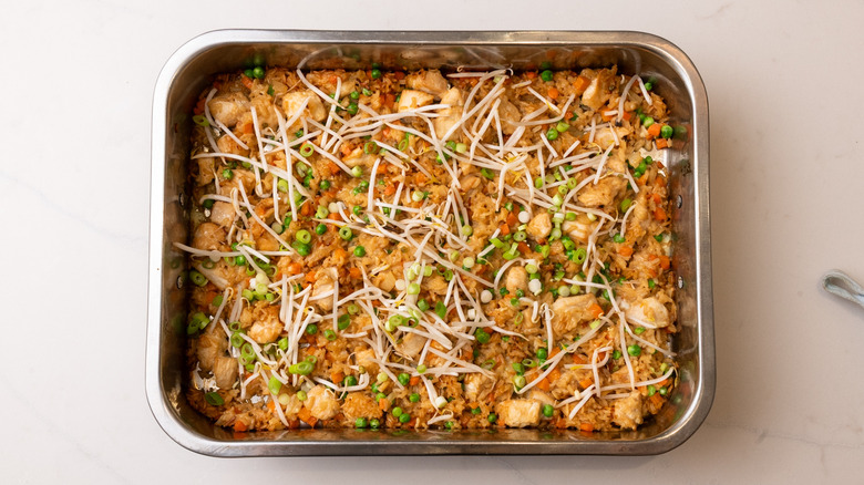 Sheet pan fried rice with bean sprouts and scallions on top