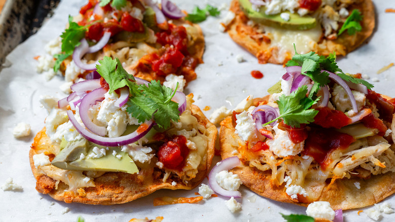 Baked chalupas on baking sheet