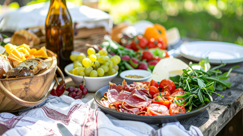 Plates of food on a table with cloth