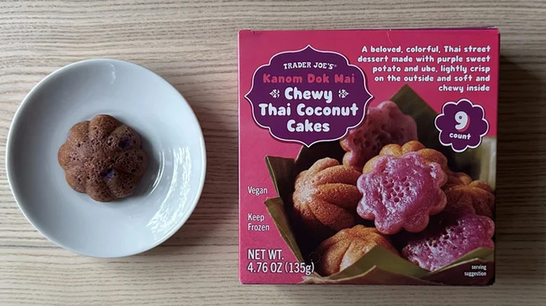 Chewy Thai Coconut cakes on a plate next to their box