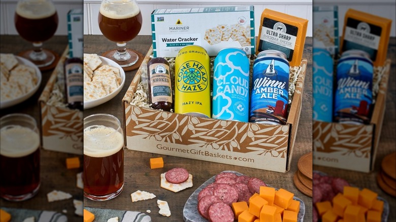 Gourmet Gift Baskets gift box on a table with the elements plated and glassed