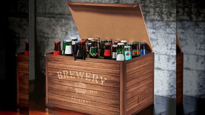 Craft bottled beer in a wooden looking cardboard box with "brewery" stamped on the front