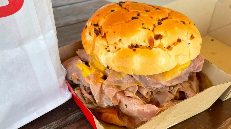 Close-up of an Arby's Beef n Cheddar Sandwich
