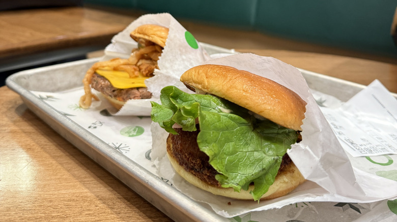 hamburger with lettuce from Shake Shack with drink