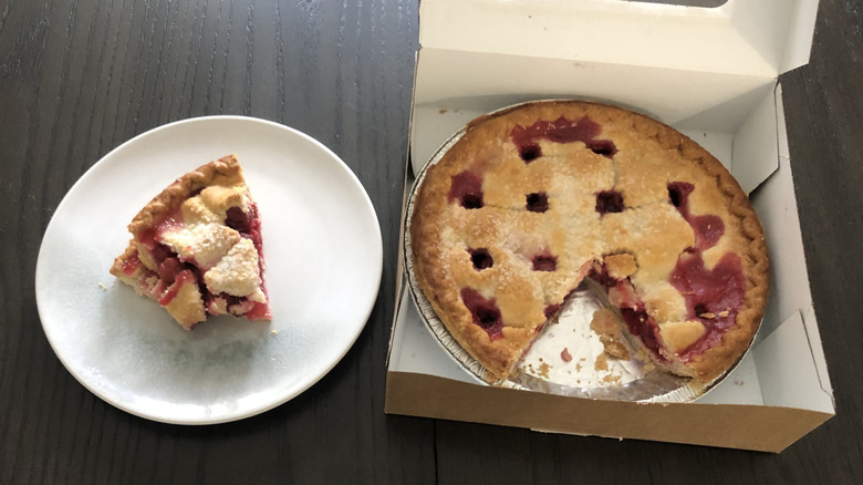 Giant Eagle Market District Cherry Pie in box next to slice of pie on white plate