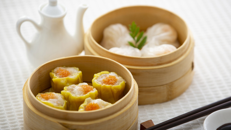 siu mai and har gow in steamer baskets