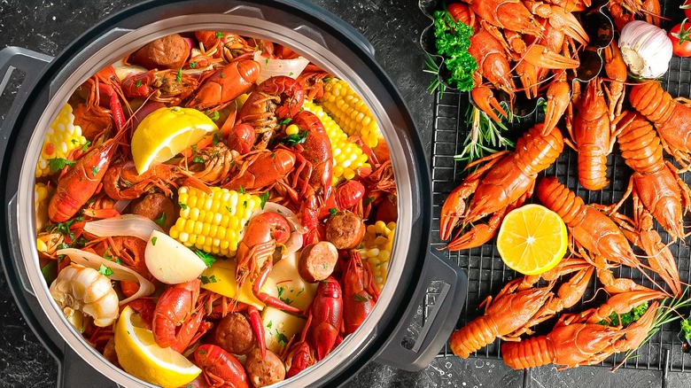 Seafood boil with crawdads, corn