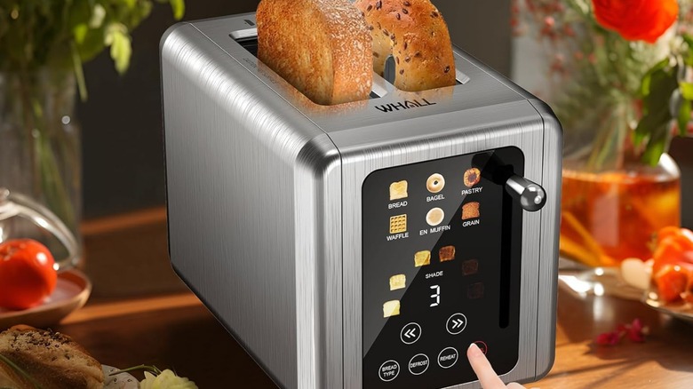 A person using a Whall smart toaster