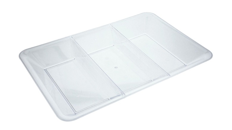 A rectangular, clear plastic tray with three compartments on a white background
