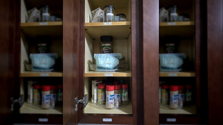 Three rotating kitchen turntables sit in cabinets and hold tea, coffee, and spices.