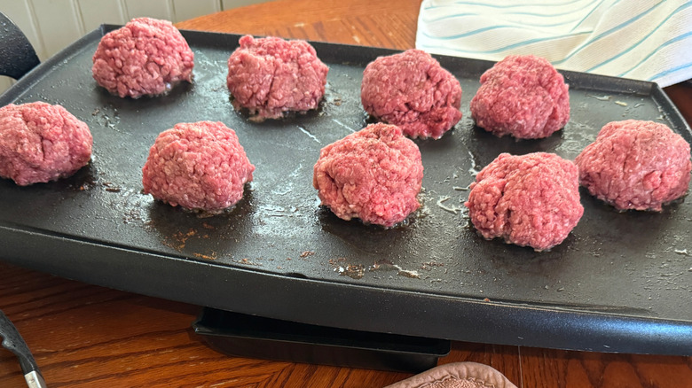 Smash burger balls on griddle