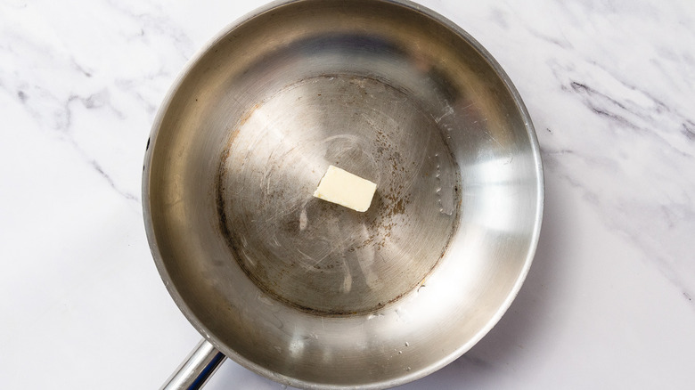 Butter in skillet
