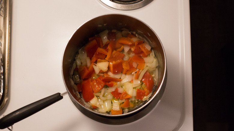 vegetables cooking in medium pot