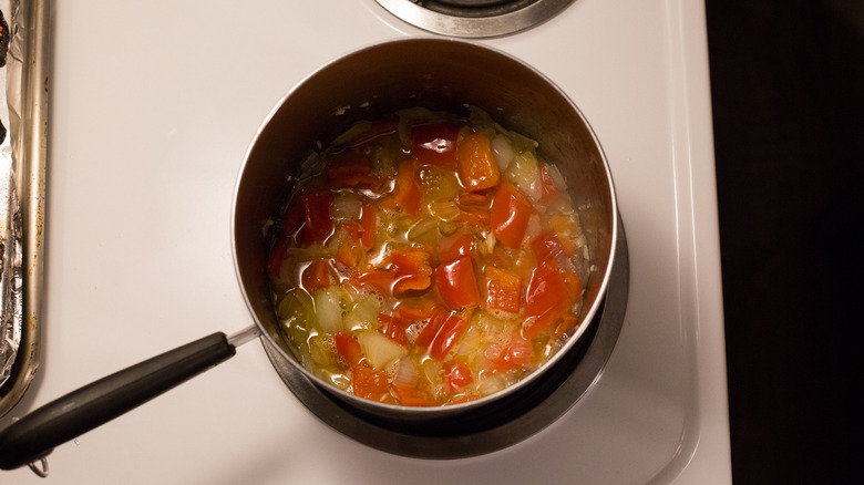 vegetables cooking in medium pot