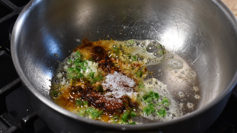jalapeño garlic and chili powder in pot