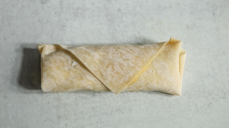 folded uncooked egg roll