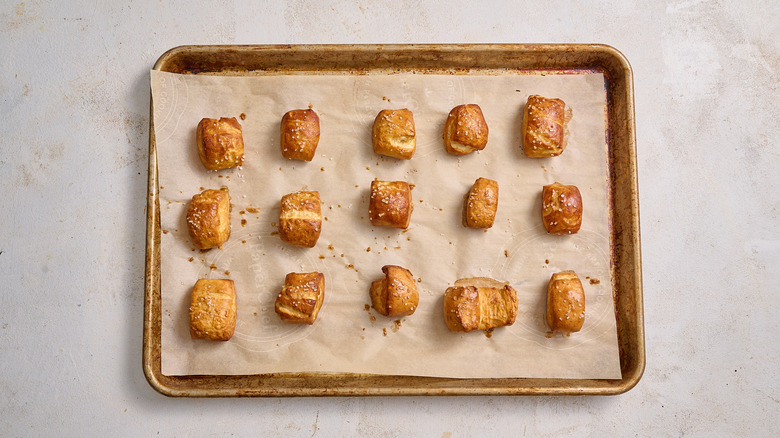 baked pretzel bites on a sheet tray