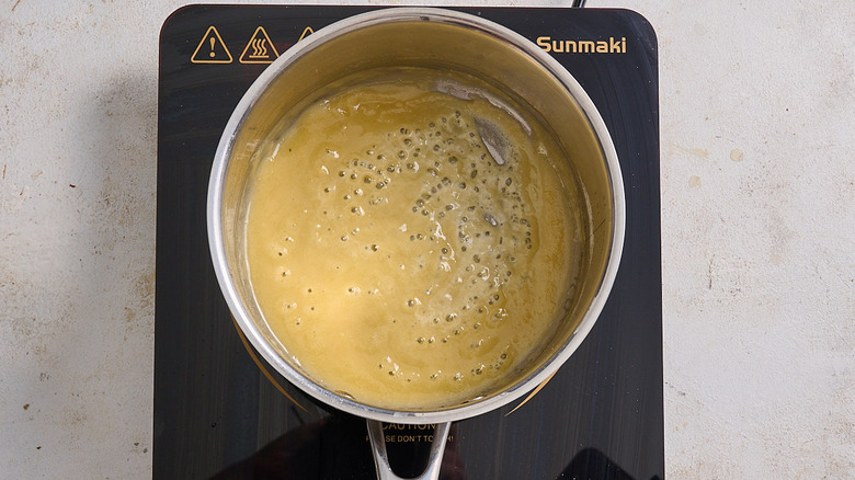 whisking flour into the butter