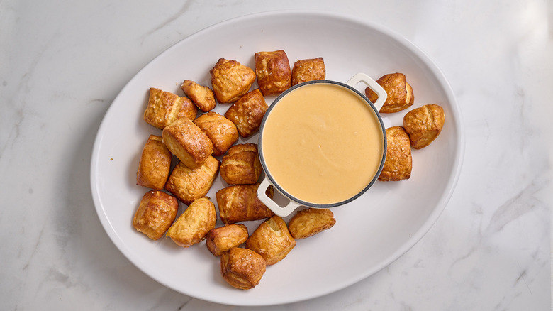 beer cheese and pretzel bites on a platter
