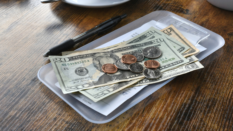 Cash tip left at restaurant