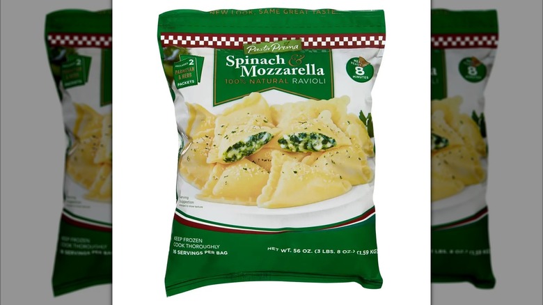 Green bag of Pasta Prima Spinach and Mozzarella Ravioli on white background