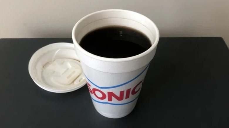 Cup of Sonic hot coffee on table