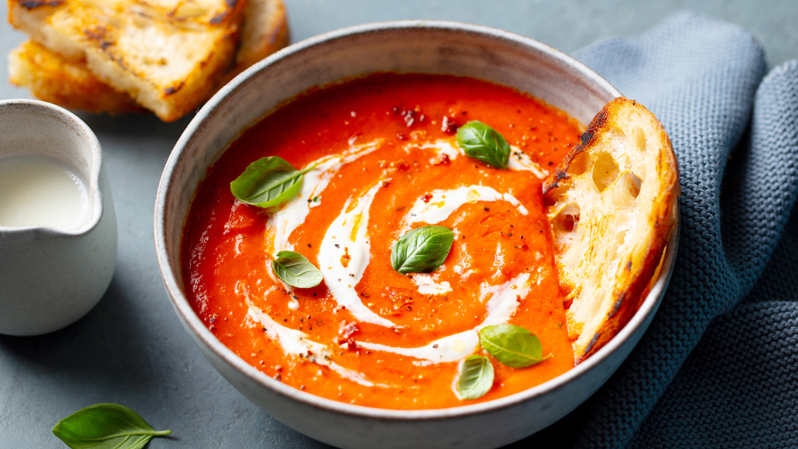 Soup Feeling Gloopy After Reheating It? One Spoonful Of This Brings It Back To Life - Tasting Table