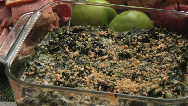 Close-up of baked cheesy spinach Madeleine dip