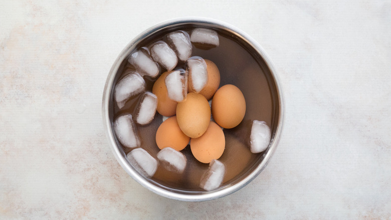 brown eggs in ice bath