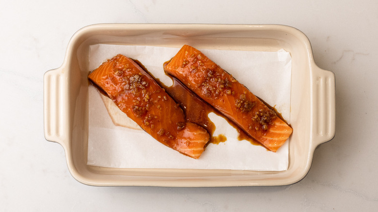 marinaded salmon in baking dish