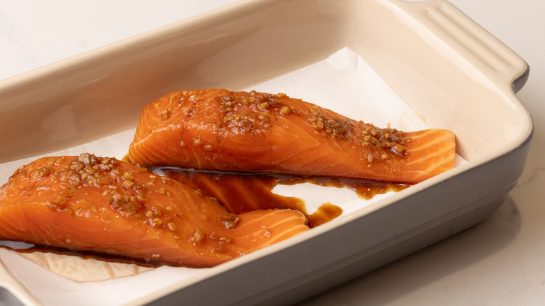 marinaded salmon in baking dish