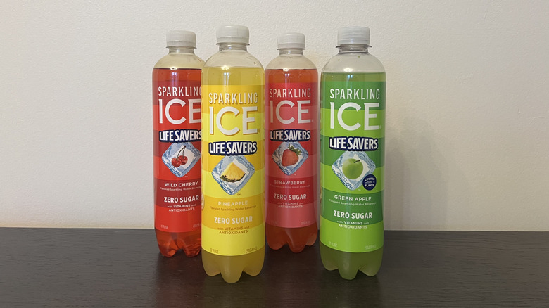 Four different flavors of Life Savers Sparkling Ice in bottles