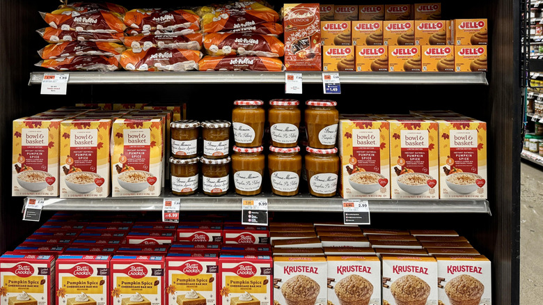Various fall baking ingredients on grocery store shelves.