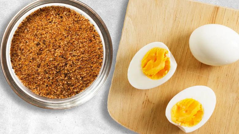 boiled eggs on board with cajun spice