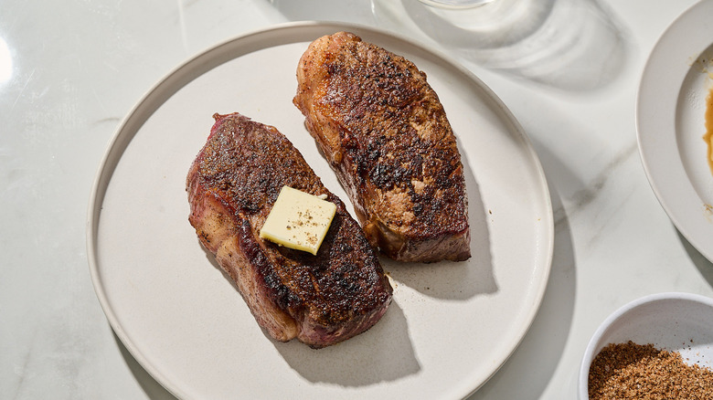 seared steaks on a plate