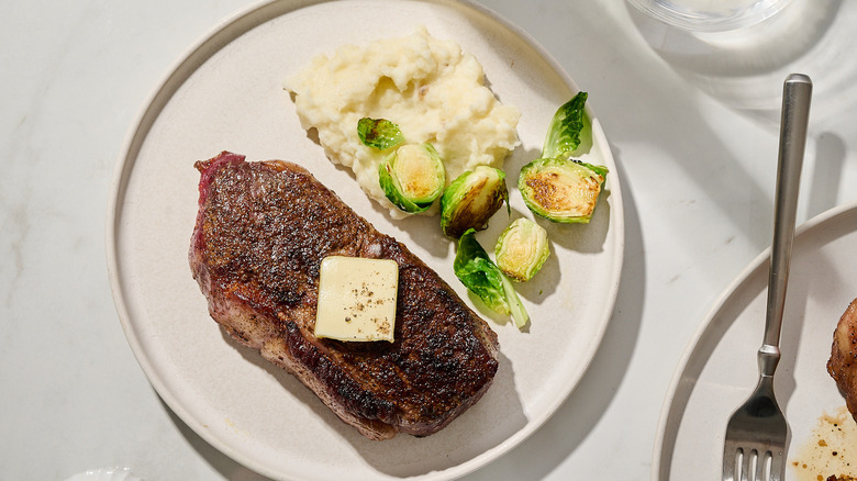 bourbon-rubbed steak on a plate