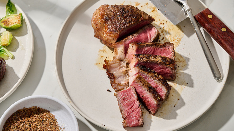 sliced steak on a plate
