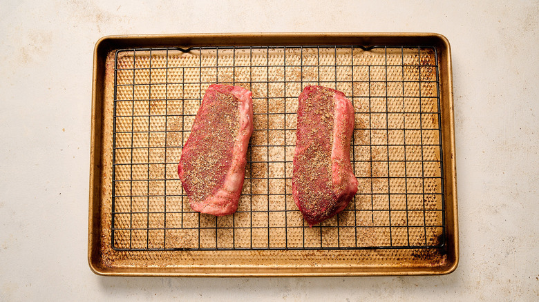 steaks rubbed with dry rub