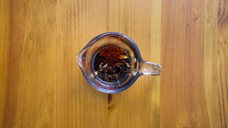 dressing ingredients in measuring cup