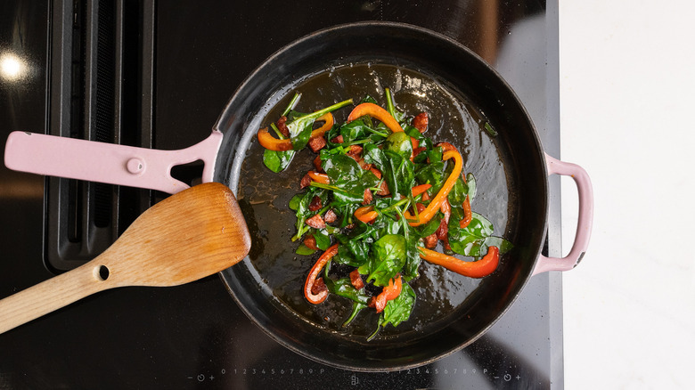 wilting spinach in pan