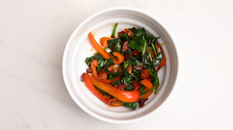 bowl containing sautéed vegetables