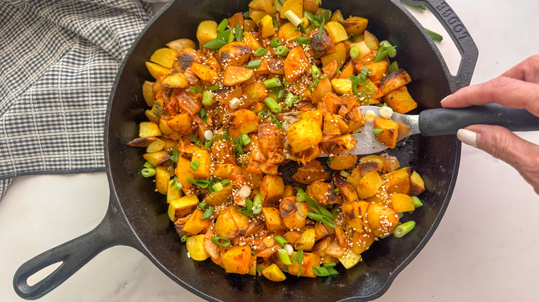 Kimchi potatoes in skillet