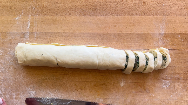 partially sliced pastry roll