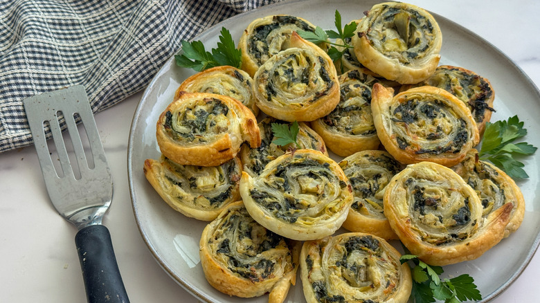 plate of spinach artichoke pinwheels