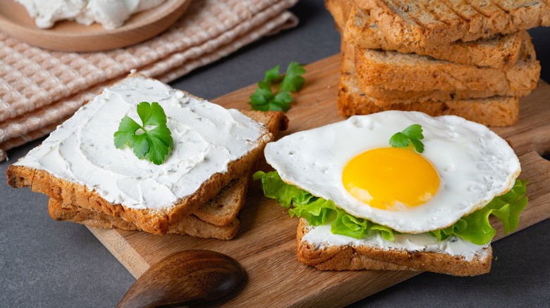 ricotta spread on bread with fried egg
