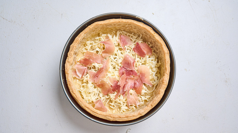 cheese and prosciutto in a baked crust