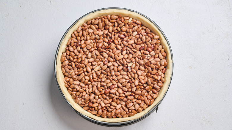 pie crust filled with pie weights